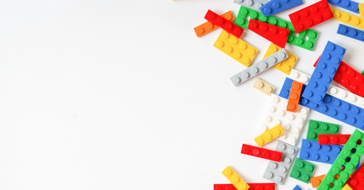 Assorted Blocks Arranged on White Surface