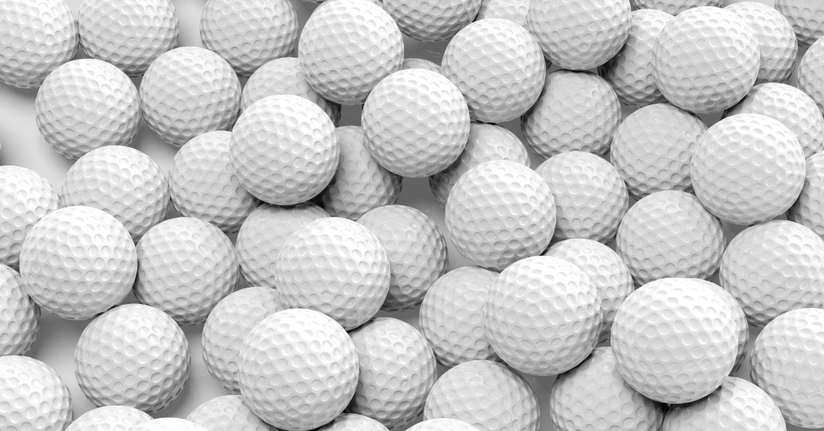 golf balls together on white