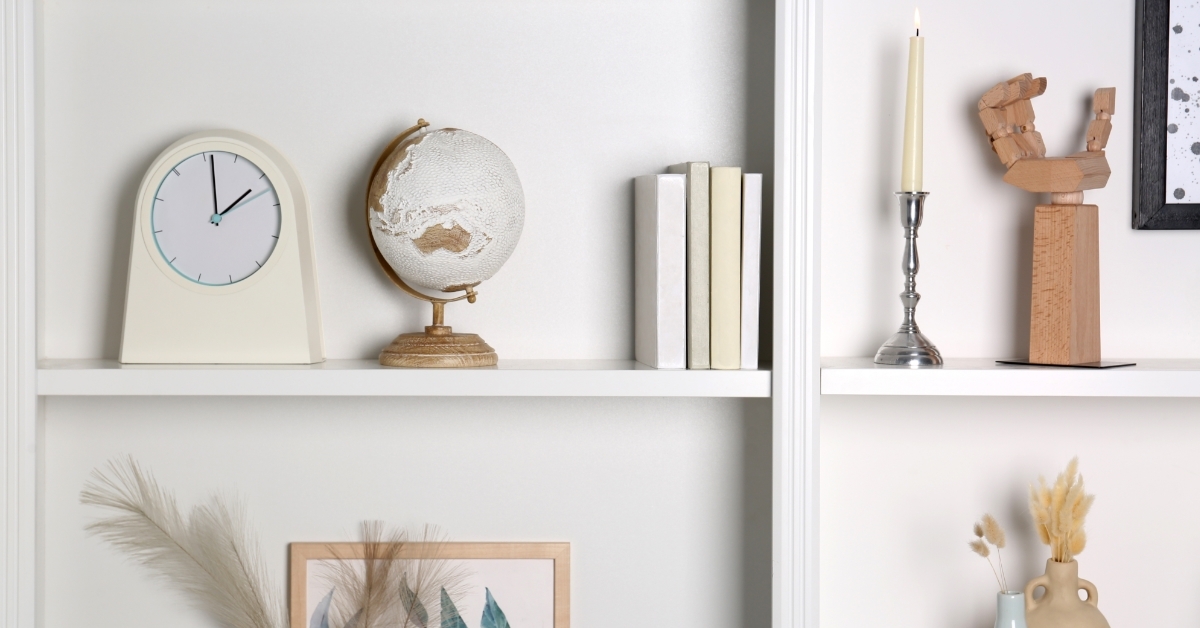 White shelves with books and decor