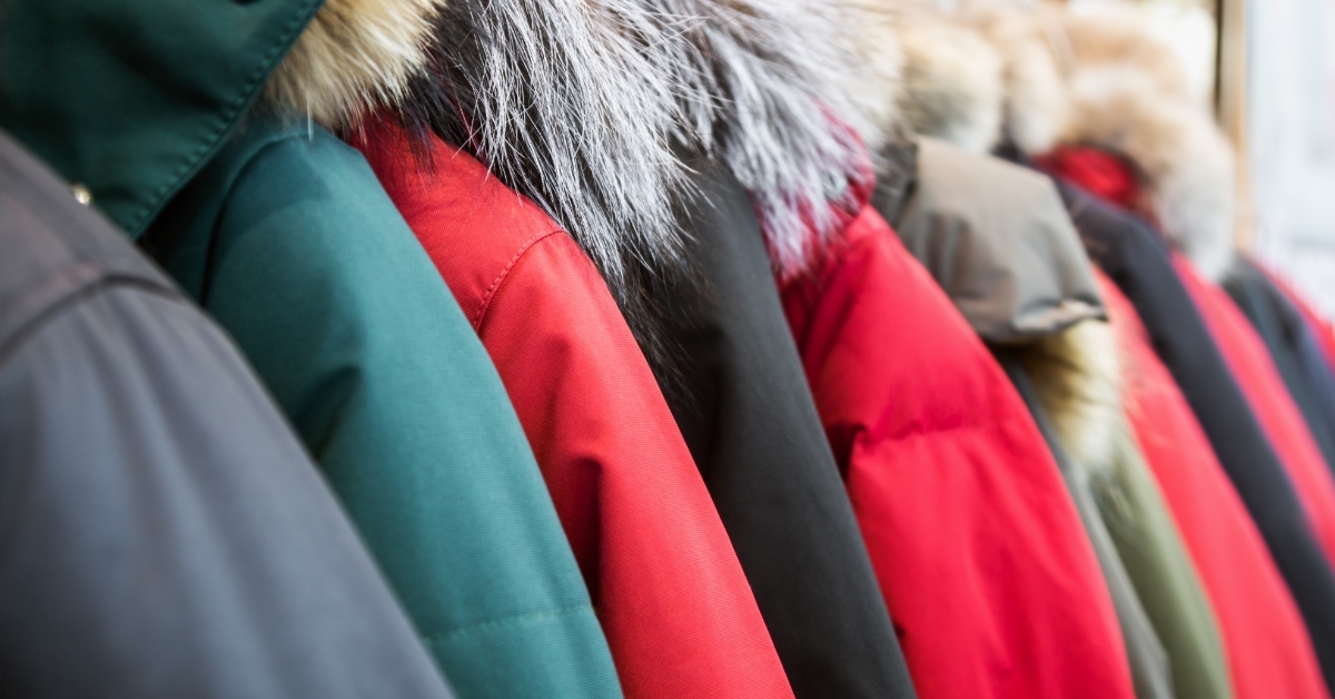 winter jackets on store hangers