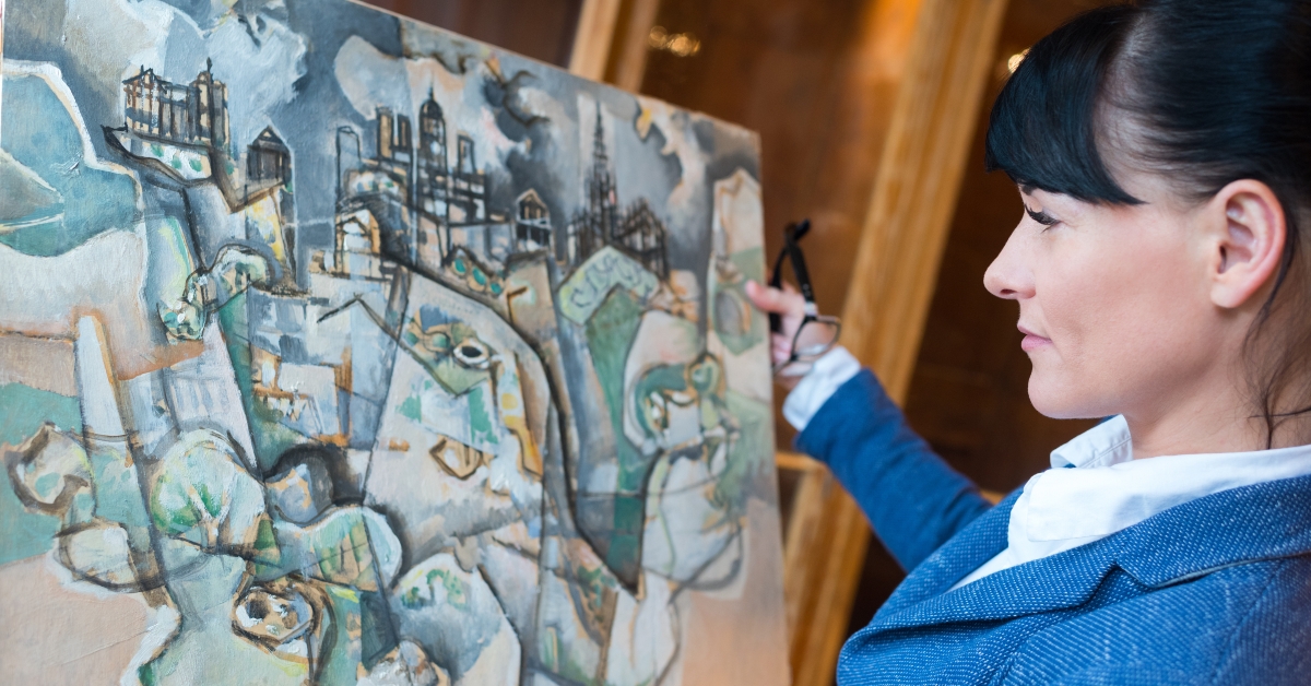 choosing picture for art gallery