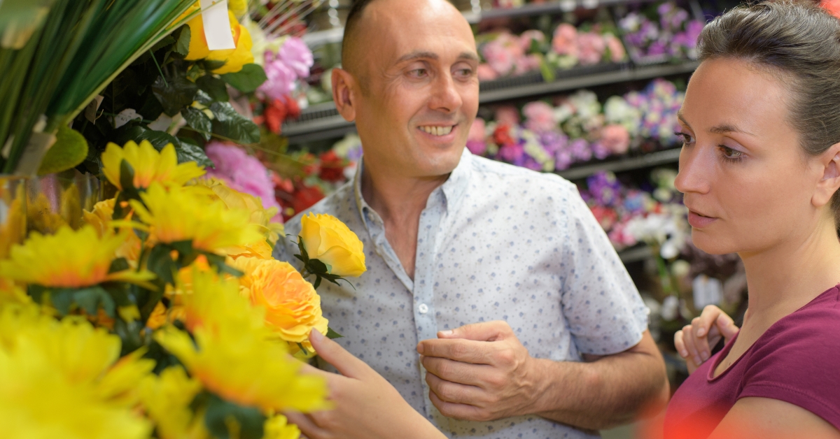 couple buying artificial flowers
