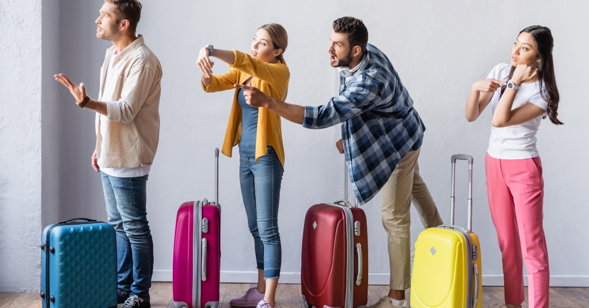 people near suitcases in airport