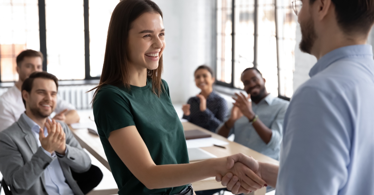 happy employee receives work promotion