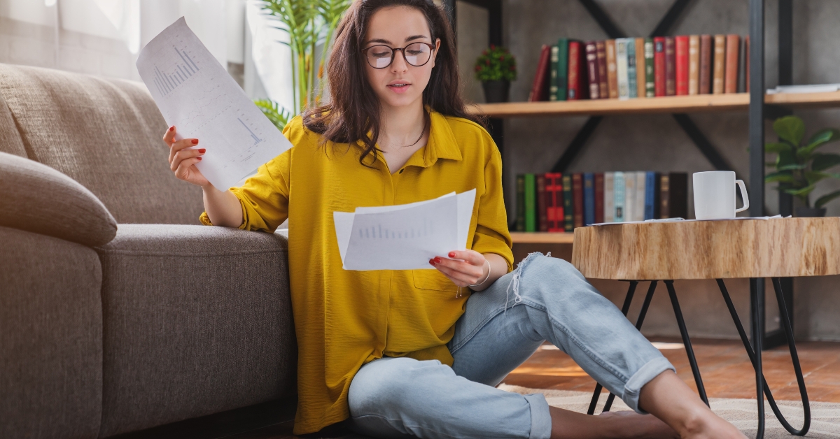 looking at bills while sitting