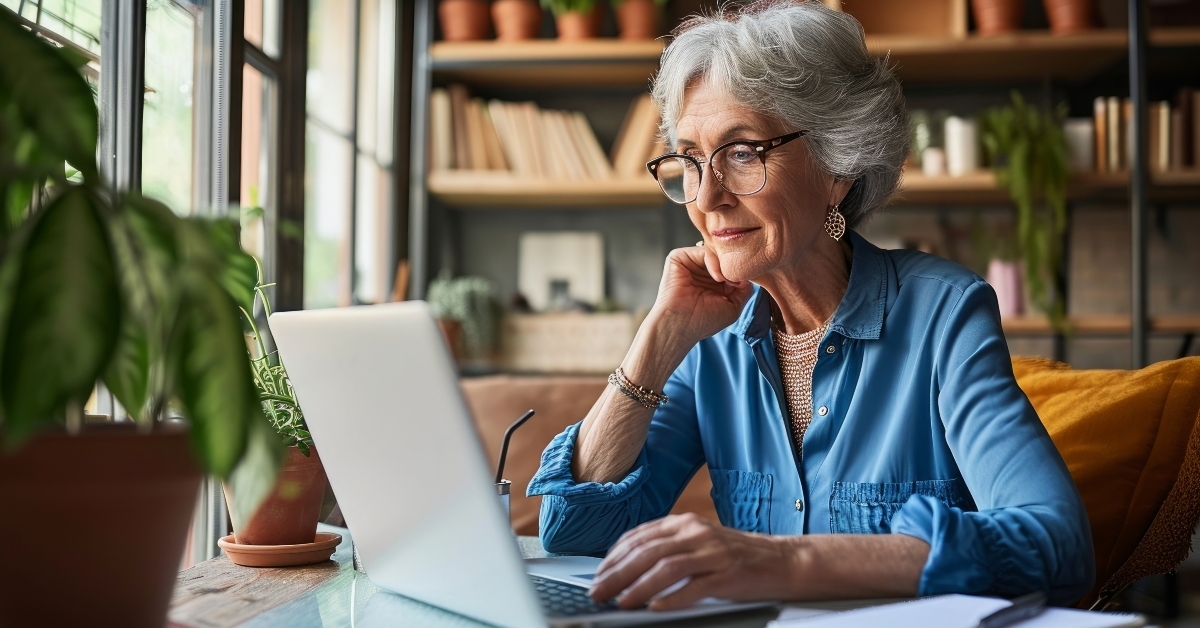 mature woman working on laptop