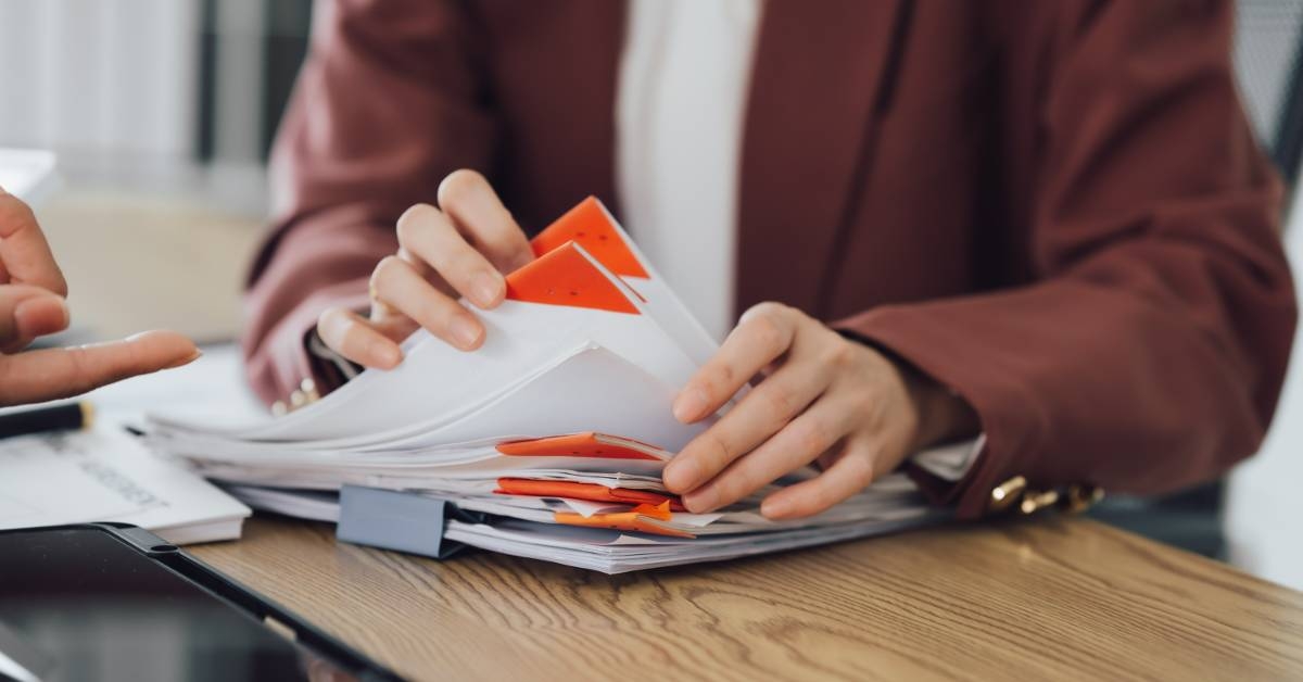 lawyer rifling through a document