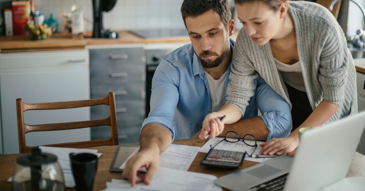 couple reading bad financial report