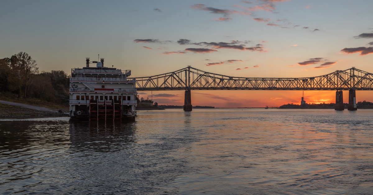 paddle cruise ship at sunset