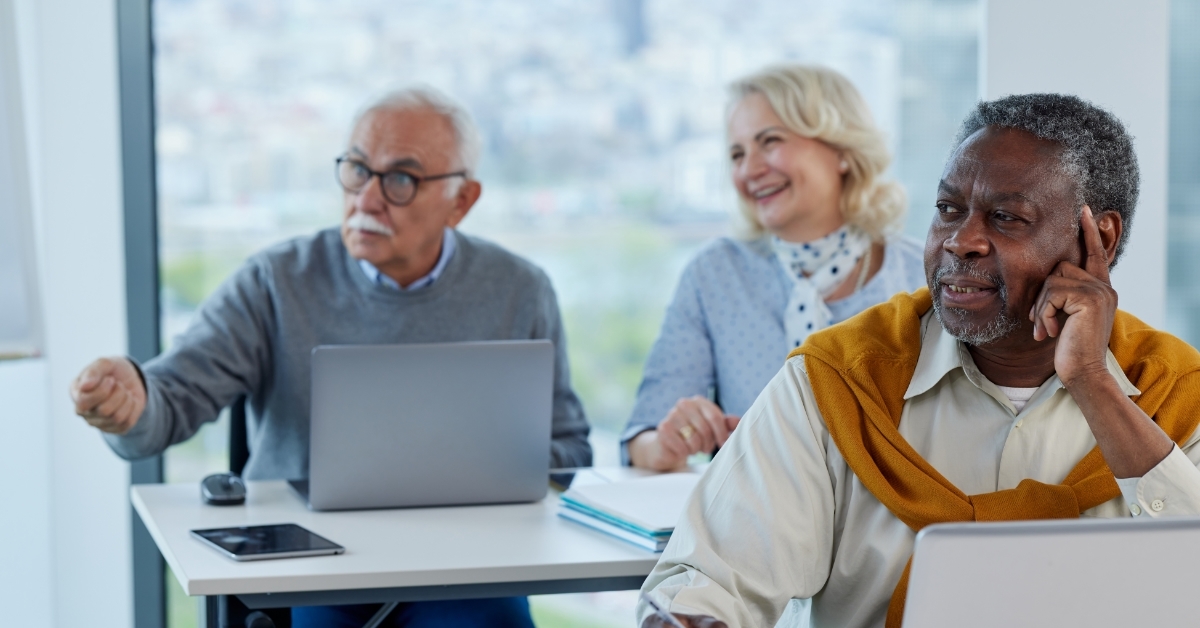 multi ethnic senior students attending class