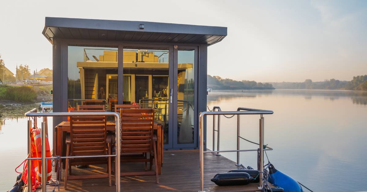 houseboat on a river in a early sunny morning