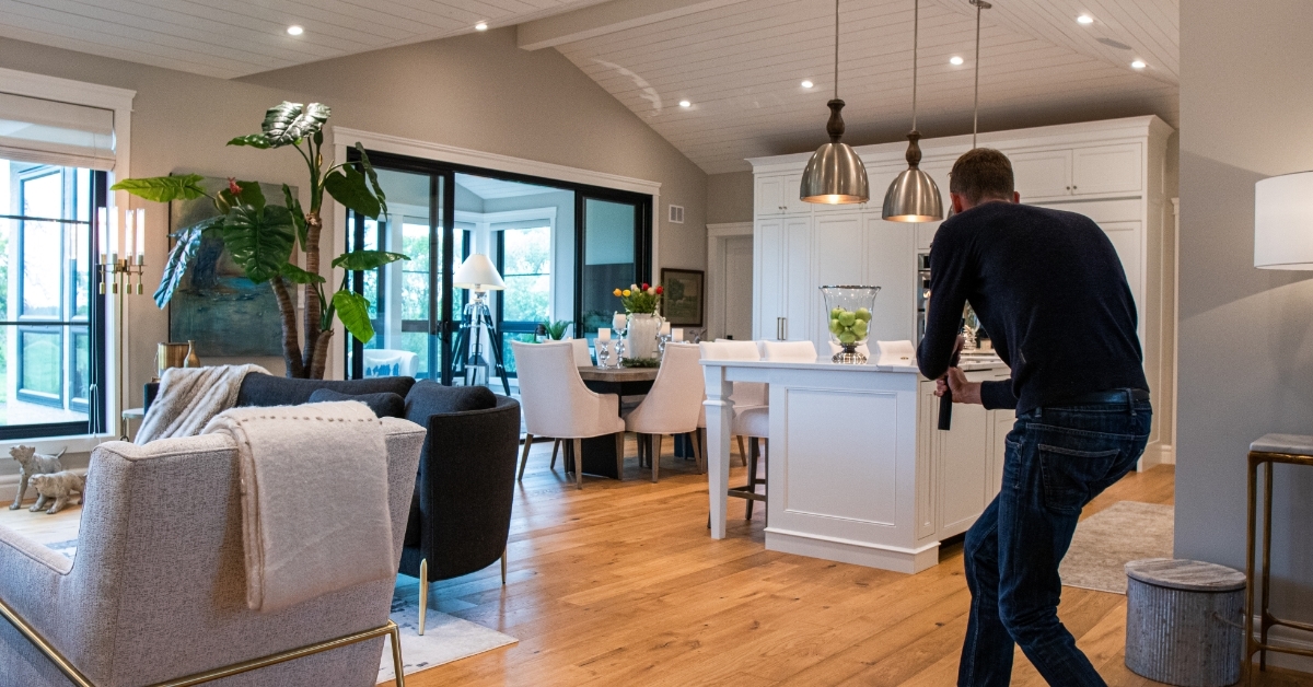 male Photographer filming real estate video