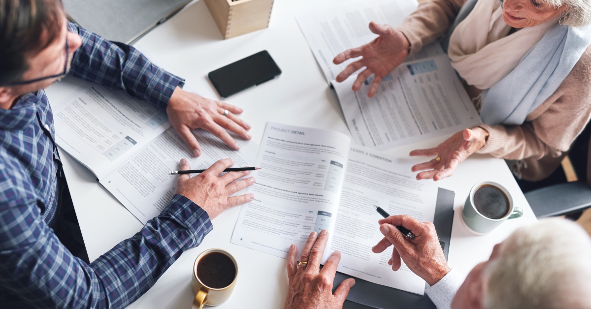 senior couple meeting their banker