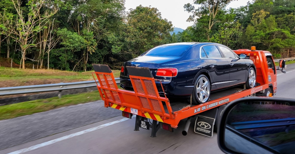 tow truck with new car bentley 