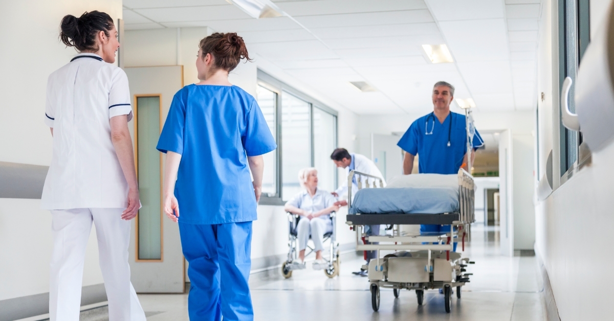 doctors walking through hospital corridor