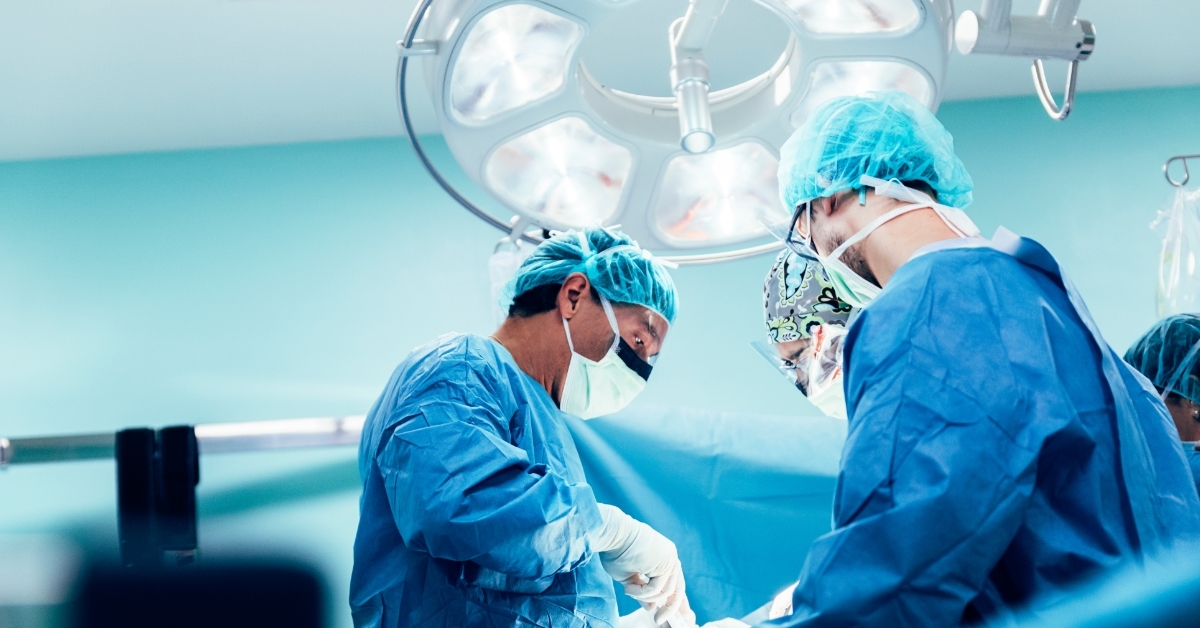 surgeons performing surgery in operation theater