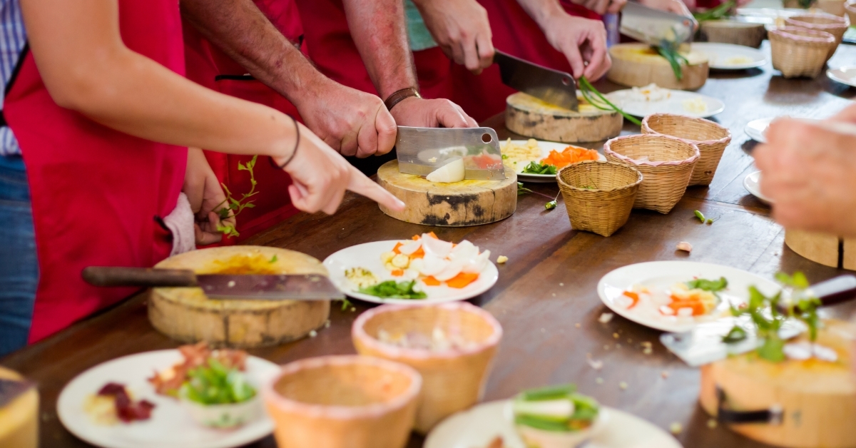 chefs preparing thai food together