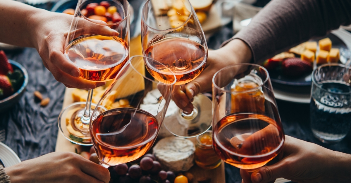 friends toasting champagne glasses at restaurant