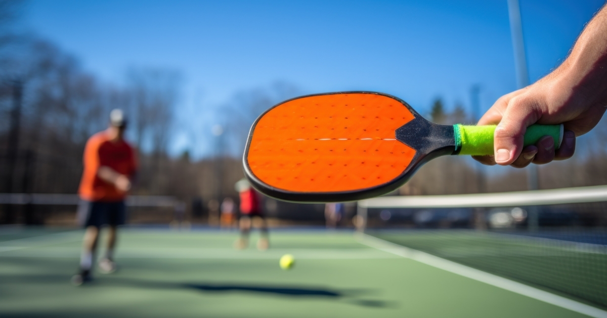 people playing pickleball at outdoor court