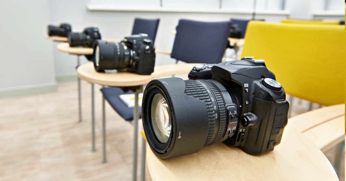 cameras on table in photography school