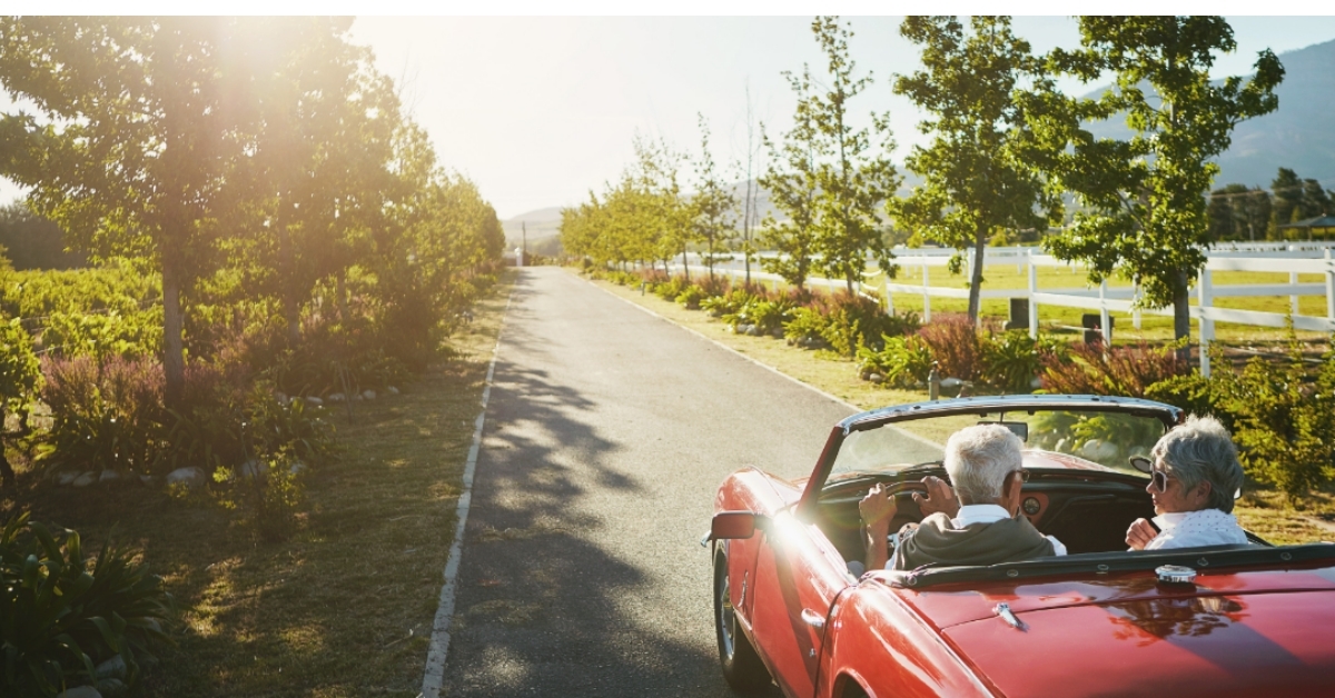 senior couple enjoying road trip