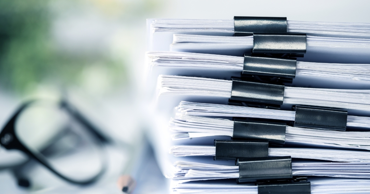 documents stack with black paper clips