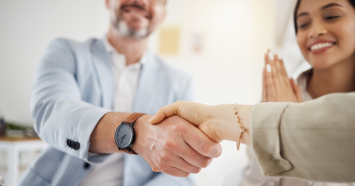 businessman shaking hand with colleague