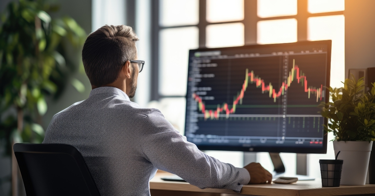 man watching stocks chart