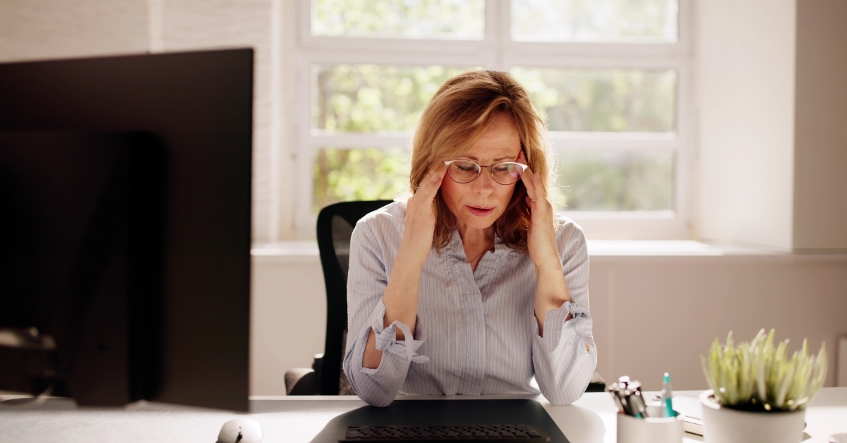 stressed female employee at office