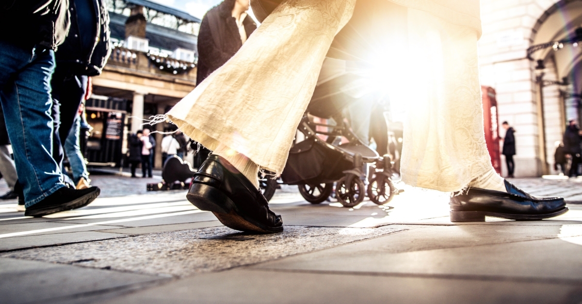 people walking on busy city street 