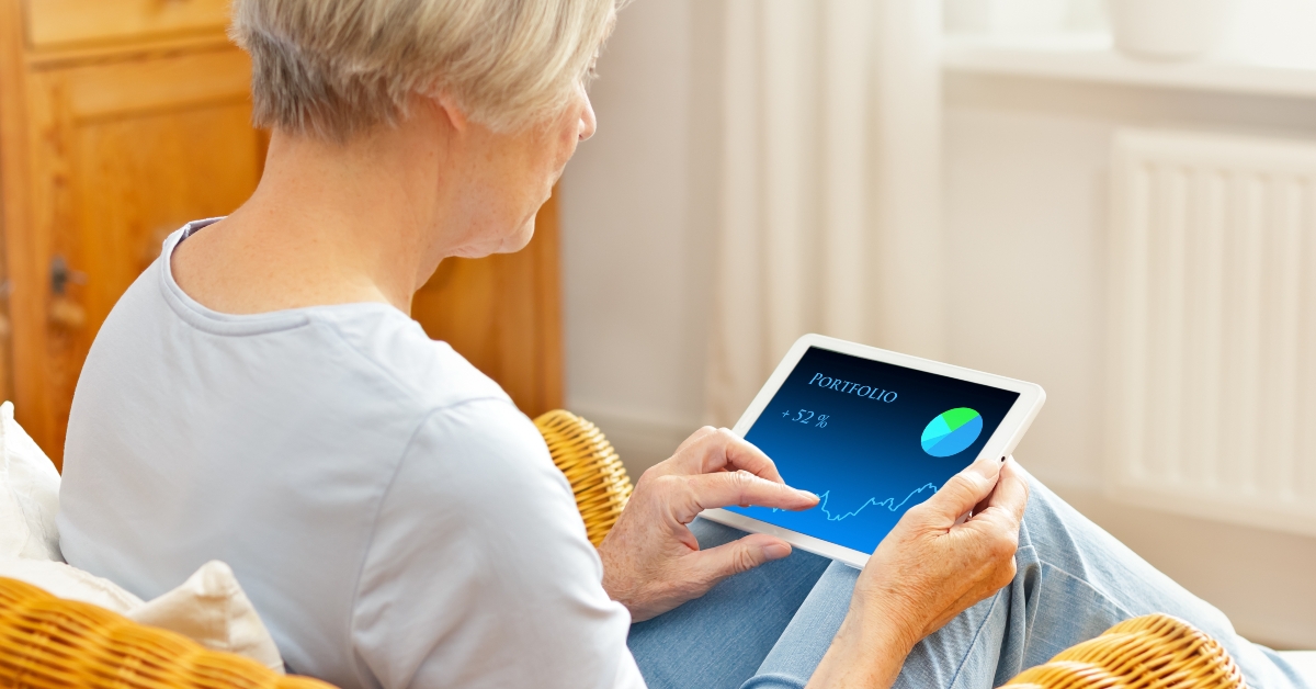 senior woman checking her investment