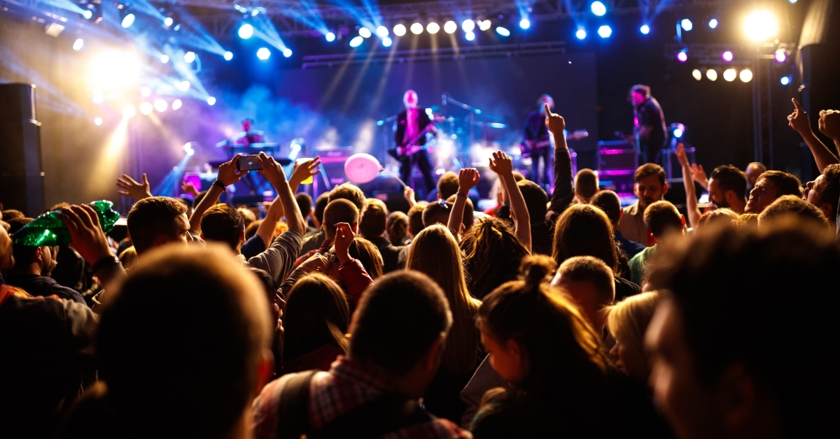 people celebrating at concert