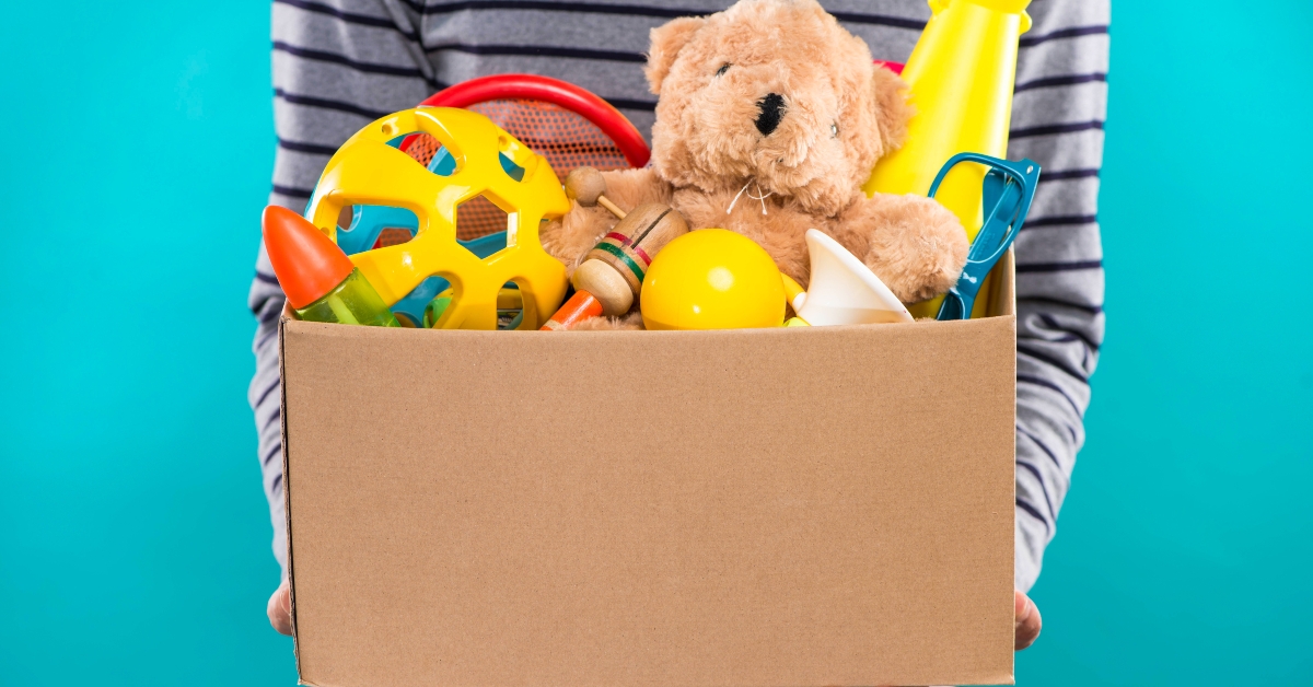 male volunteer holding donation box