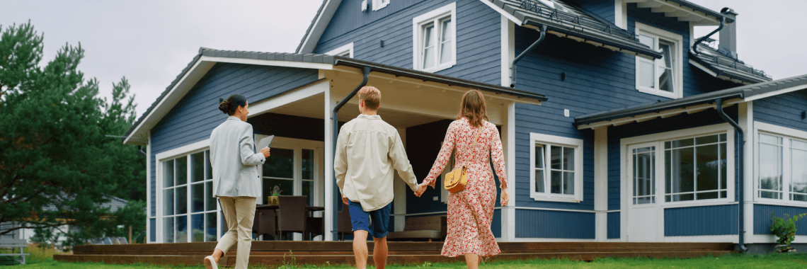 Couple Viewing Property for Sale, Talking with Professional Real Estate Agent Outside the House