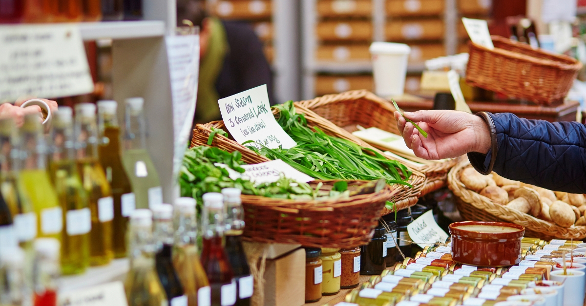 man buying fresh leek
