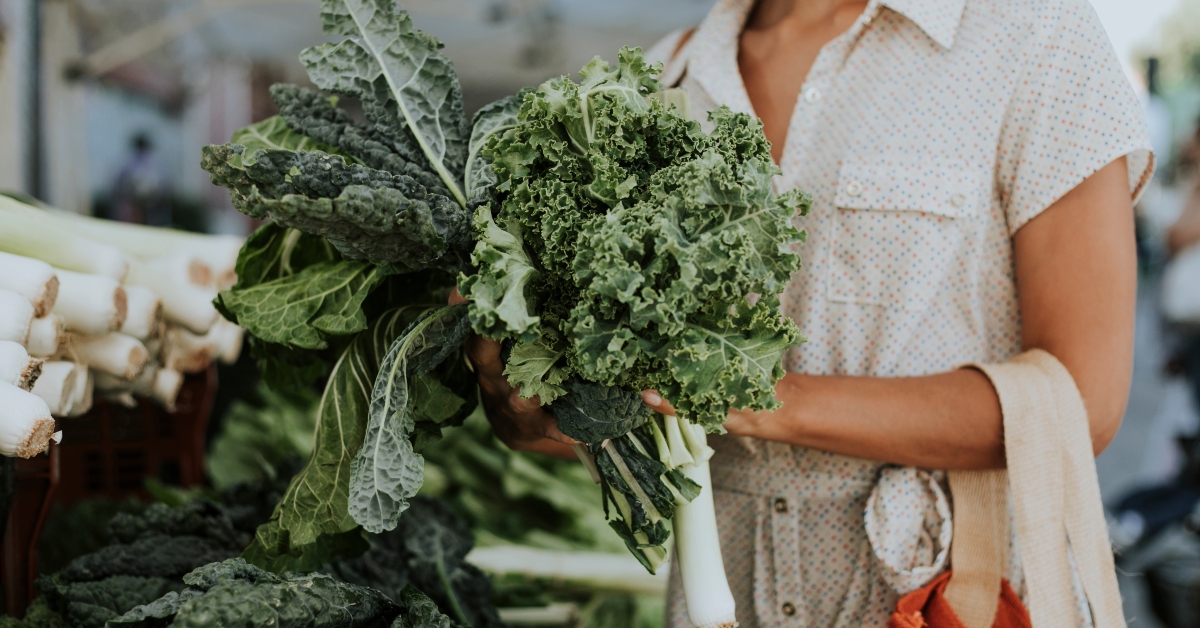 woman buying kale