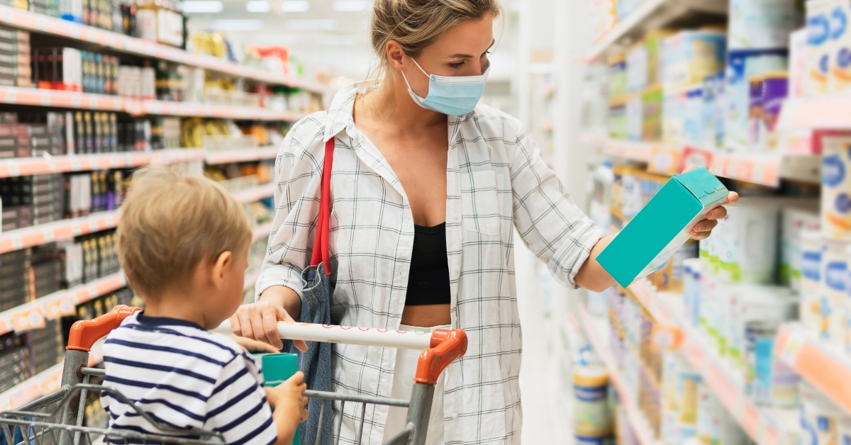 mother and her little son in a supermarket