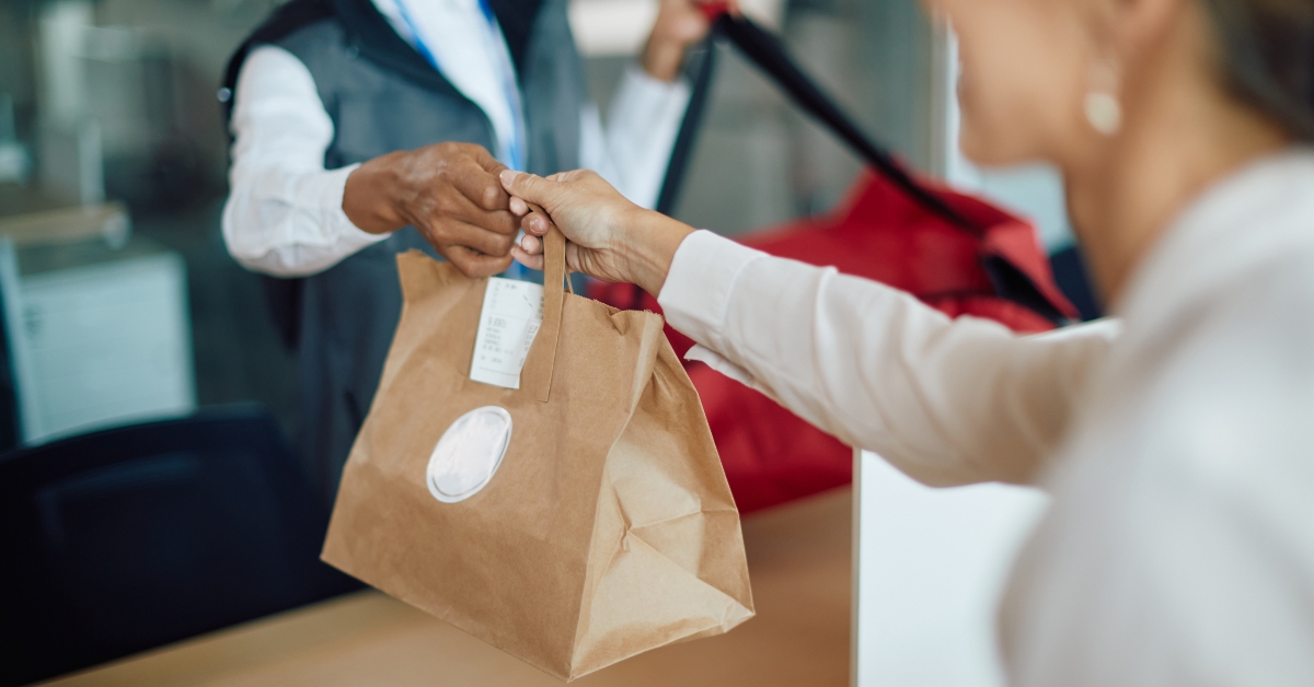 woman receives food delivery