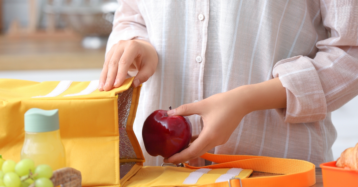 woman packing fresh meal