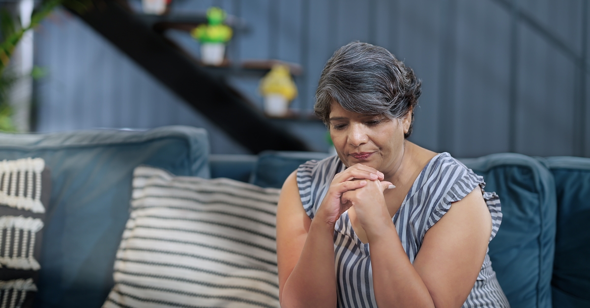 tired tense female sitting alone