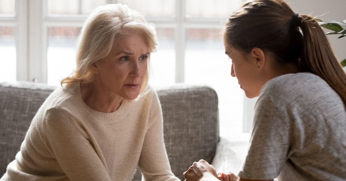 worrying woman listening to daughter