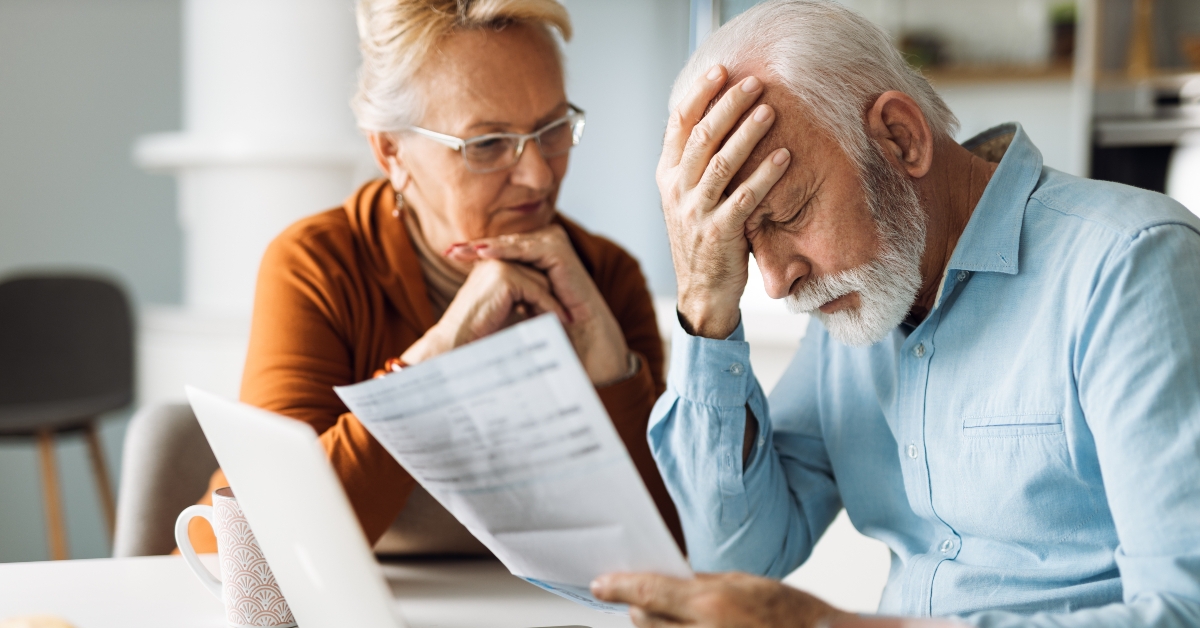 frustrated senior couple