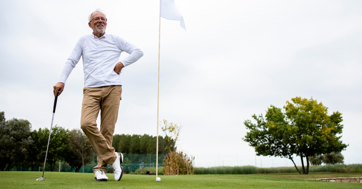 senior man playing golf