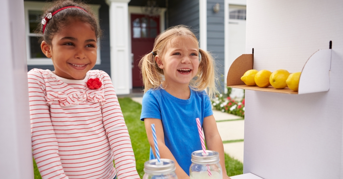 Girls Running Homemade Lemonade Stand