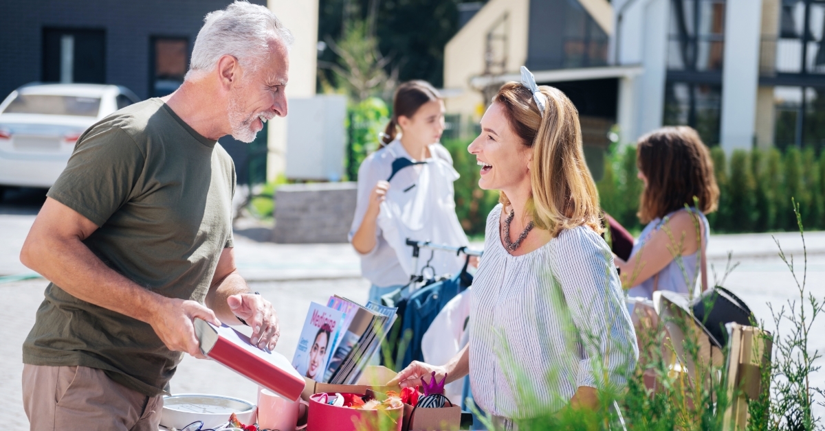 woman talking at yard sale