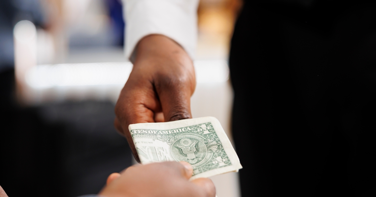 worker accepting of cash payment