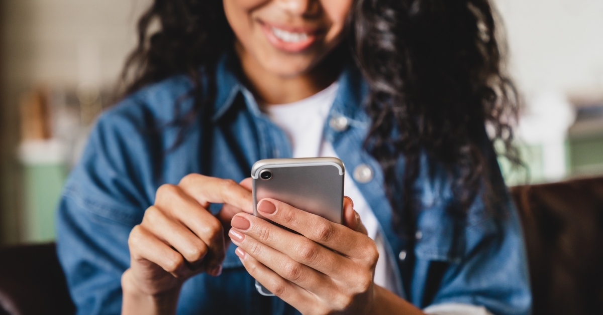 african-american woman using smart phone