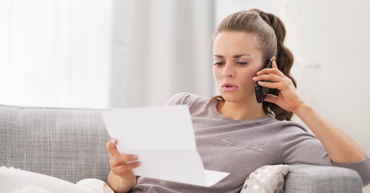concerned woman with letter