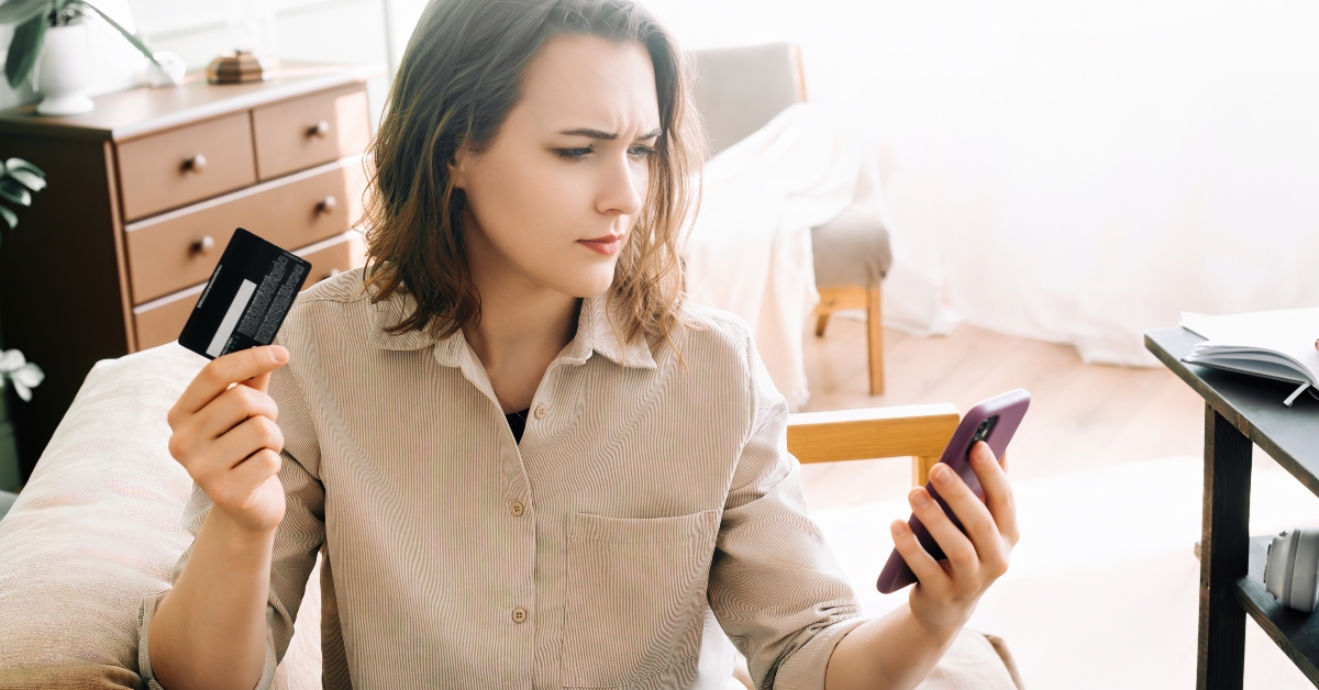 credit card typing on smartphone