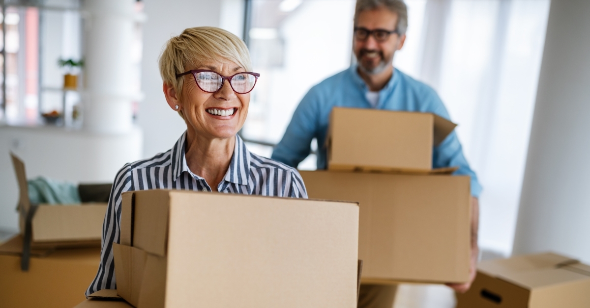 senior couple moving in new home